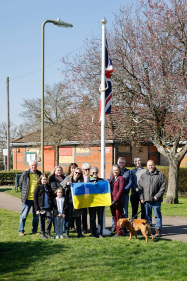 Local Conservative volunteers with the Ukraine flag